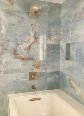 Most beautiful; custom Porcelian tile surrounds new custom over sized tub /shower
