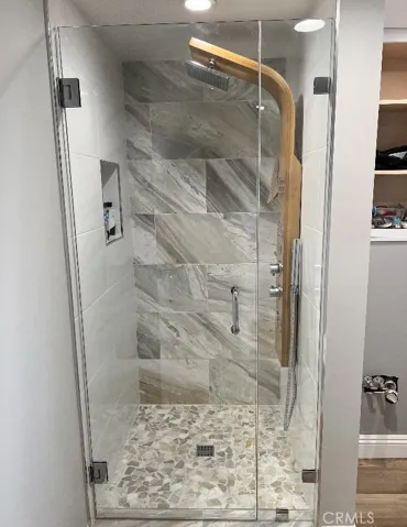 Custom built new shower with detailed stone/tile you must see in person to truly see the colors