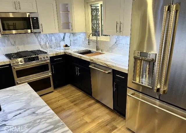 You must see in person to truly appreciate every custom detail in this amazing open kitchen