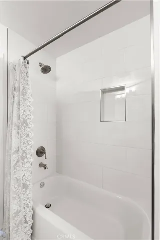 Remodeled hall bathroom with tub