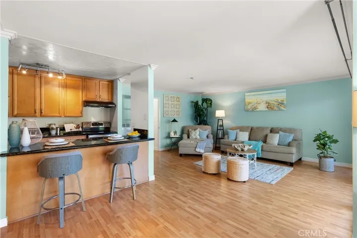 Living Room with small counter with chairs