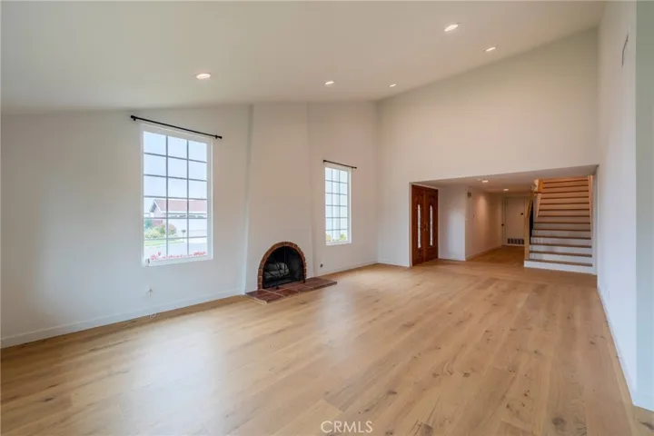 Walk in to the large open living space with vaulted ceilings.