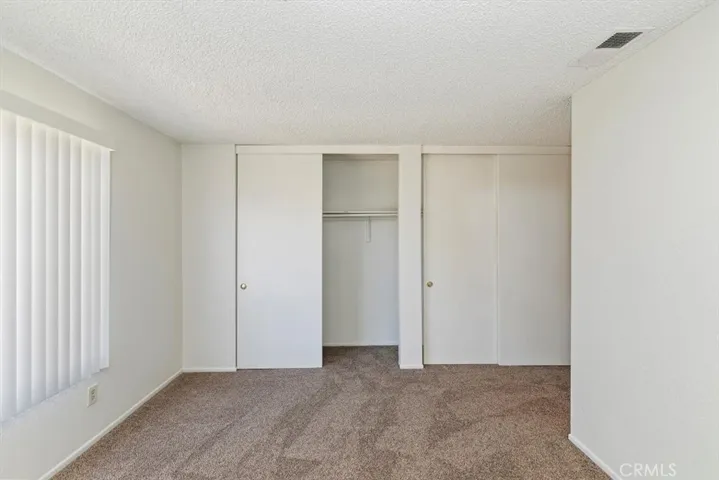 Primary bedroom with 2 large closets