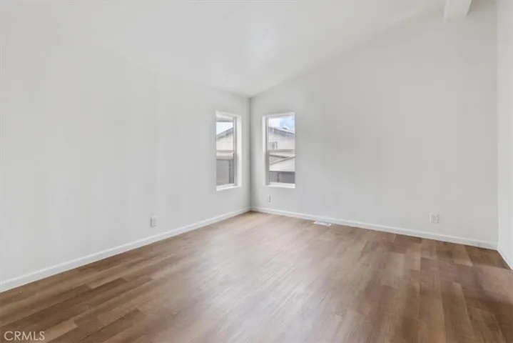 Master bedroom with new floor and high ceilings