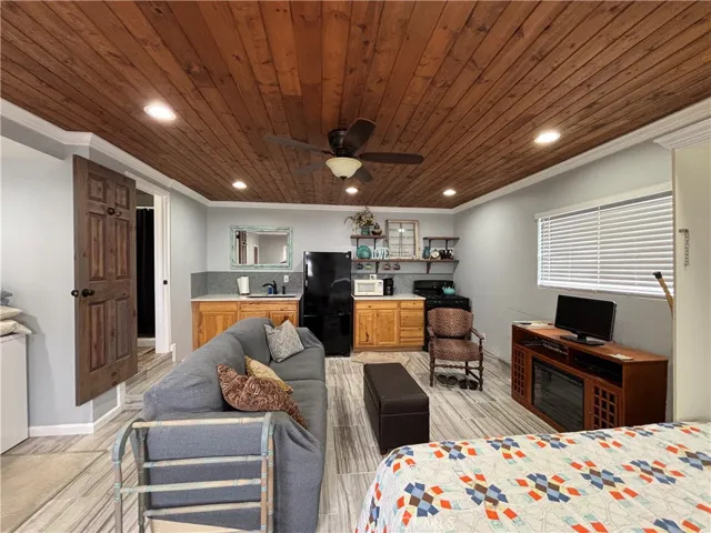 Notice the detail on this ceiling. Charming space.