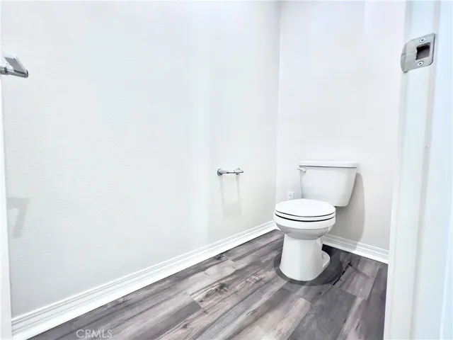 Primary bedroom toilet with private door