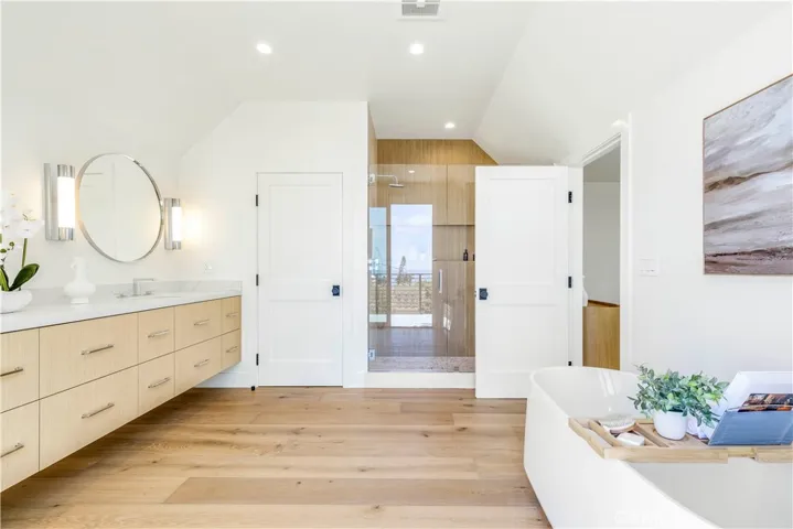 ANOTHER VIEW OF PRIMARY BATH LOOKING TOWARD OVERSIZED WALK IN SHOWER