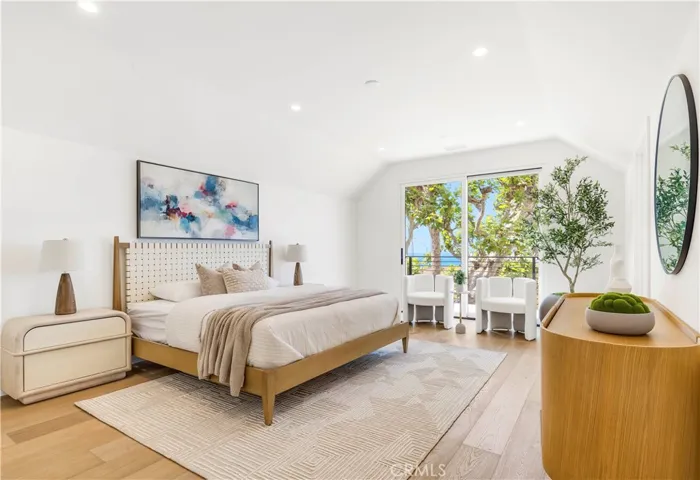 THERE ARE 3 POTENTIAL PRIMARY SUITES, BUT THIS ONE IS LARGEST AND HAS LARGE PRIVATE DECK. THE VIEWS ARE SERENE.