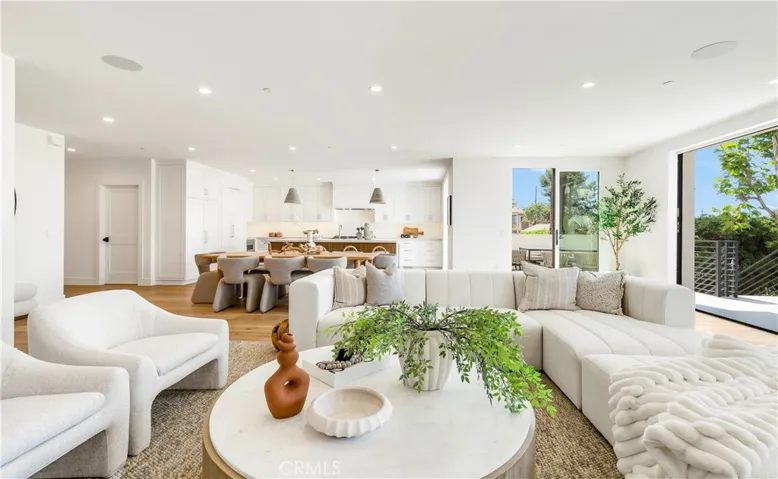 FROM LIVING AREA LOOKING TOWARD KITCHEN