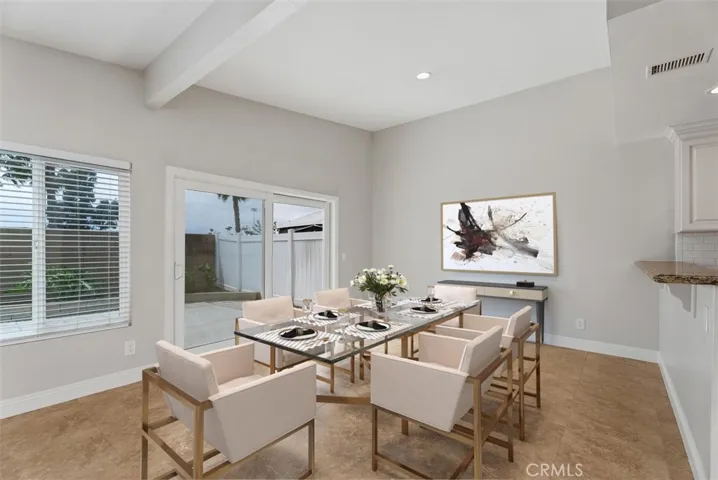 Dining room has been virtually staged