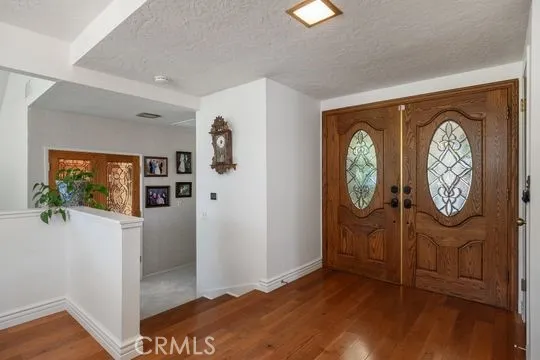 Step down to Living room and Primary Bedroom