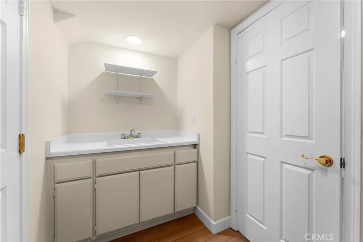 down stairs indoor laundry room