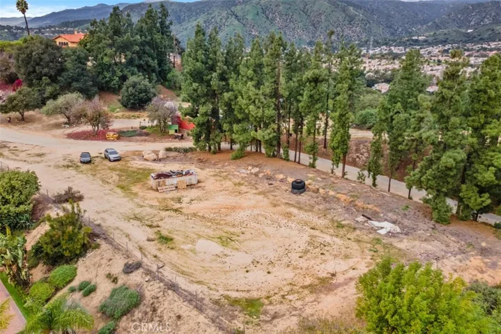 Spot for a 2nd house. Lot has been cleared.