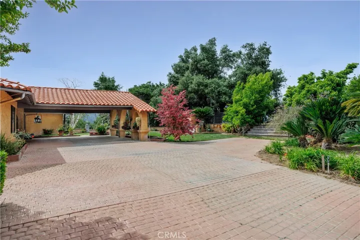 Wide Drive leading to porte-cochere.