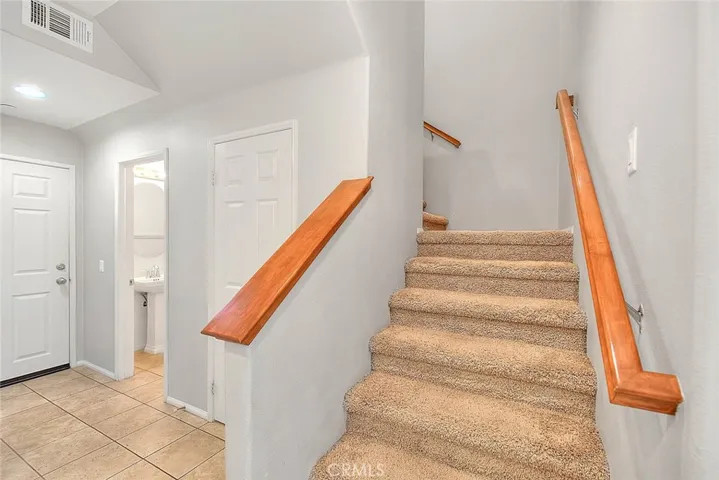 downstairs powder room to the left of stairway