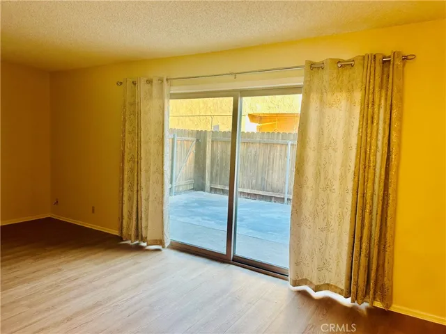Living Room with a view of the back Patio