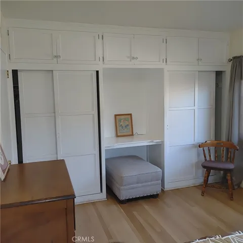 bedroom 3 two closets and upper storage