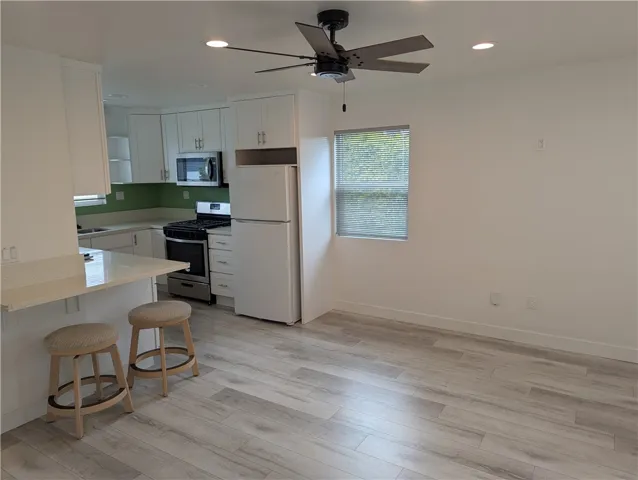 Living Room/ Kitchen