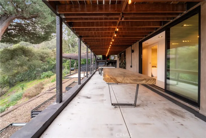 Downstairs covered patio off bedroom