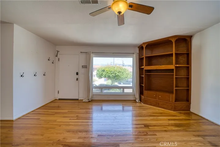 Built in entertainment center is covering fireplace