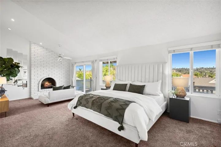 Upstairs, the primary suite offers a private retreat with a spacious layout