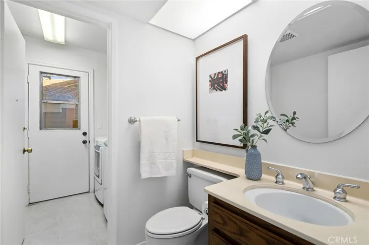For added convenience, the home includes an individual laundry room with washer and dryer