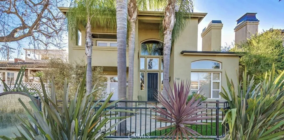 Front House-property entrance is located on left side of this house