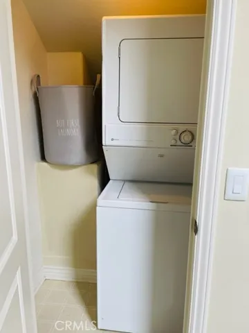 Washer/dryer at main
entrance closet