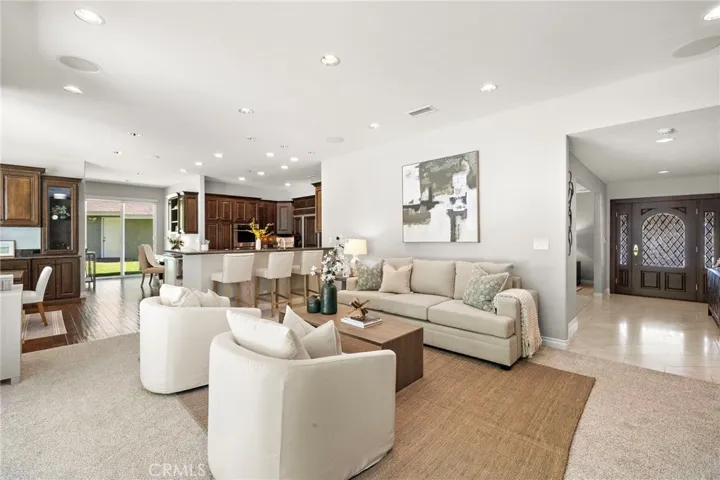 Family room view to kitchen and front door