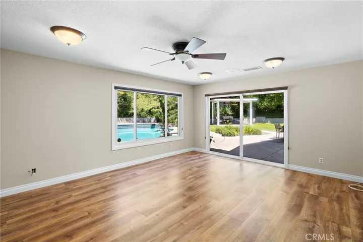 Pool/activity room with slider to backyard