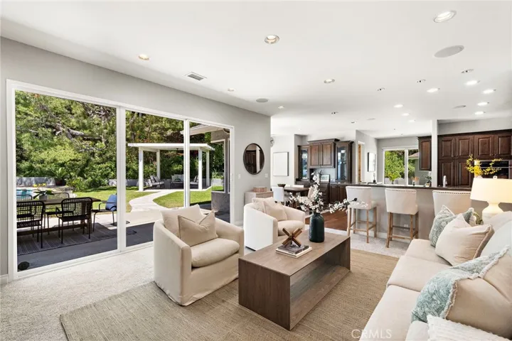 Family room with view to backyard and kitchen