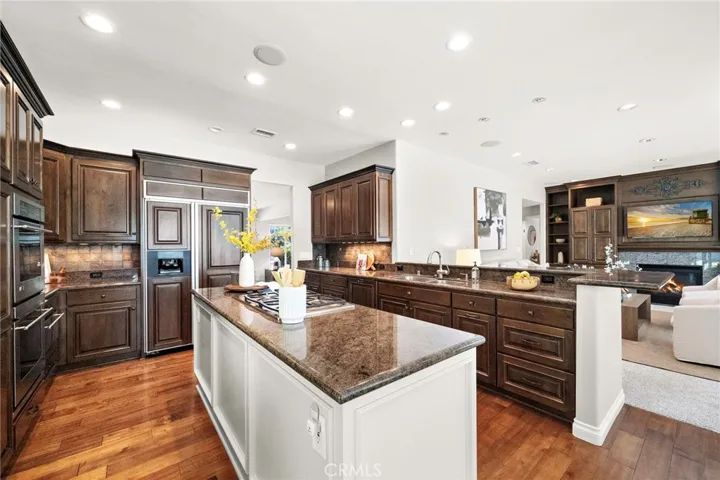 Kitchen opens to family room for inclusive entertaining