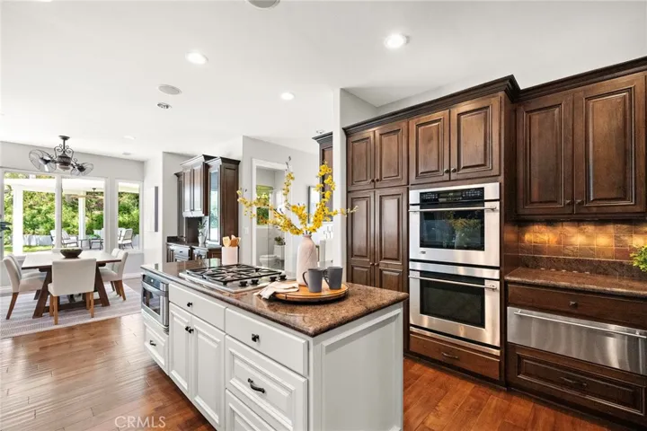 Kitchen with double ovens and storage galore