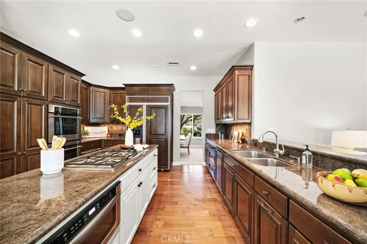 Chef's kitchen with built-in refrigerator
