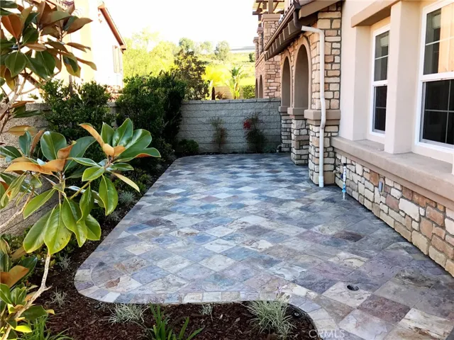 Enclosed patio area and side yard