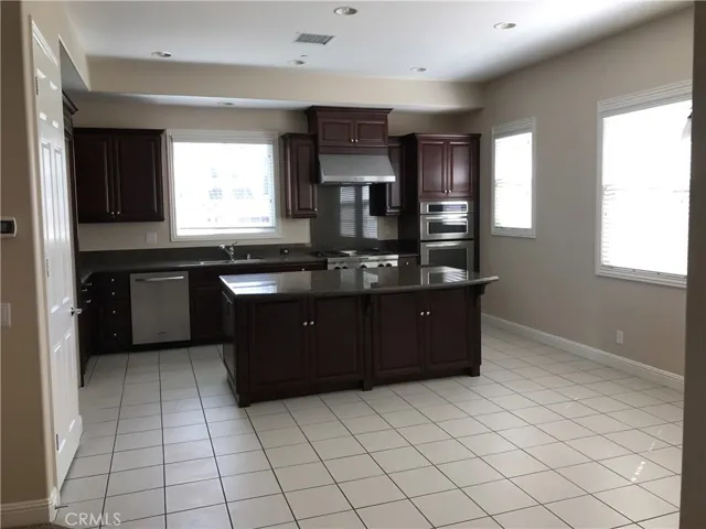 Gourmet Kitchen with Granite and Kitchen Aid Appliances