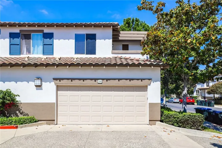 2 car garage with overhead storage and built-ins.