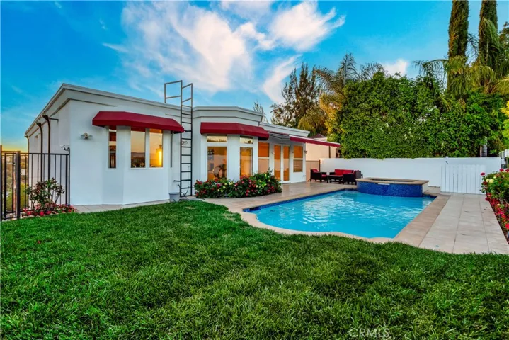 Pool and backyard from right corner