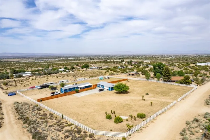 Over 2 acres of freedom! Main house on the left. ADU on the right.