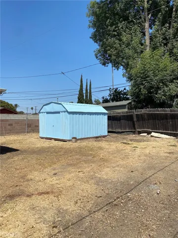 Huge yard with nice size storage shed.