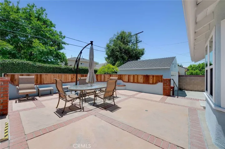 Open backyard patio perfect for entertaining