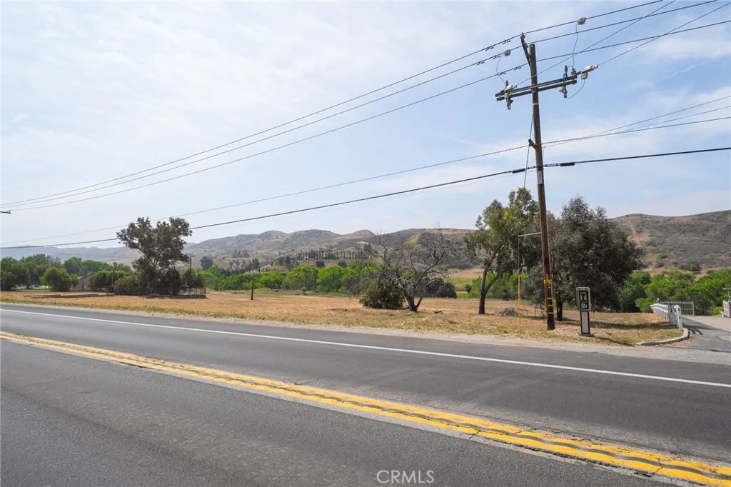 Views of rolling hills behind property