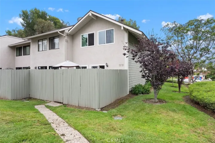 Rear exterior has gate for easy access to...