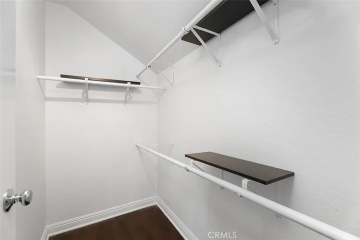 Spacious primary walk-in closet