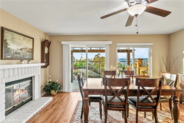 Fireside Family Room (currently used as dining room) with slider to back patio.
