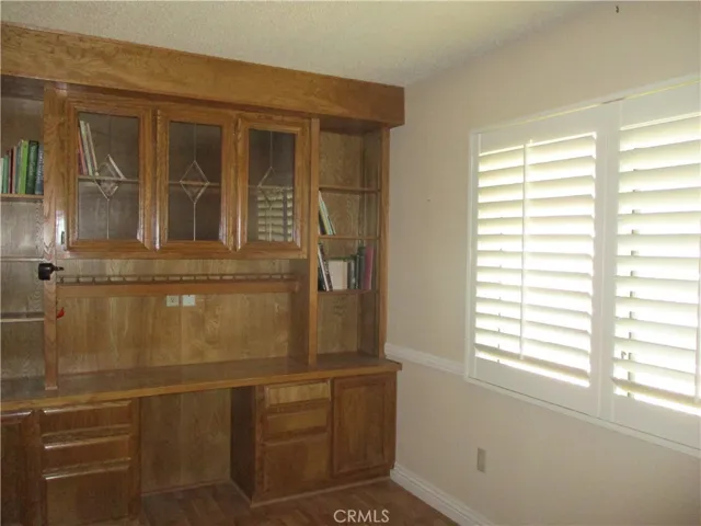 Office with built in bookcases and shelves