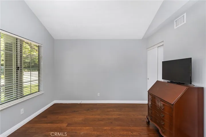 Downstairs bedroom (#3) with vaulted ceiling