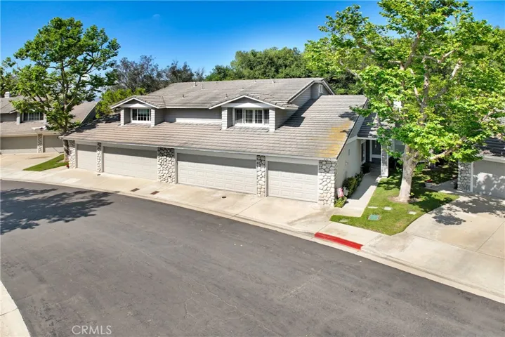THREE CAR GARAGE, the home only shares one wall with the neighboring home!