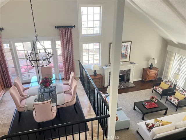 View of living/dining rooms from loft area