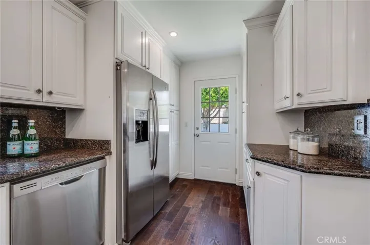 Kitchen with access to back yard